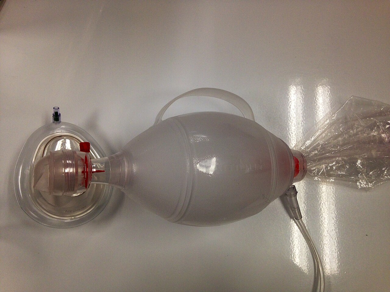 Self-inflating bag-valve-mask with clear face mask, reservoir tubing and one-way valve